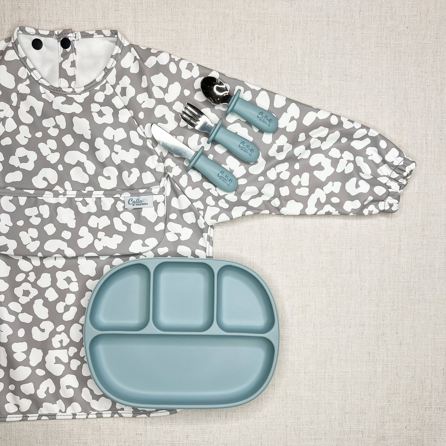 The Grayson Long Sleeve Bib - Leopard: Petal Pink / 6-36M